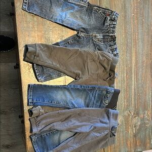 Toddler blue jeans and sweats.